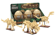Tray of 3 Dinosaur Eggs with Stegosaurus, Triceratops & Velociraptor - Beanie Games